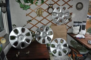 4x Original Opel wheel center caps 15 inch 13265184 RD Corsa D Adam - Picture 1 of 10