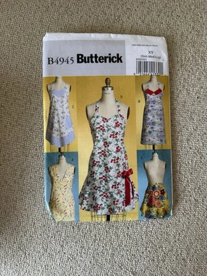 BUTTERICK PATTERN 4945  APRONS  MISSES SIZES SMALL MEDIUM LARGE UNCUT NEW  FF - Image 1 of 2