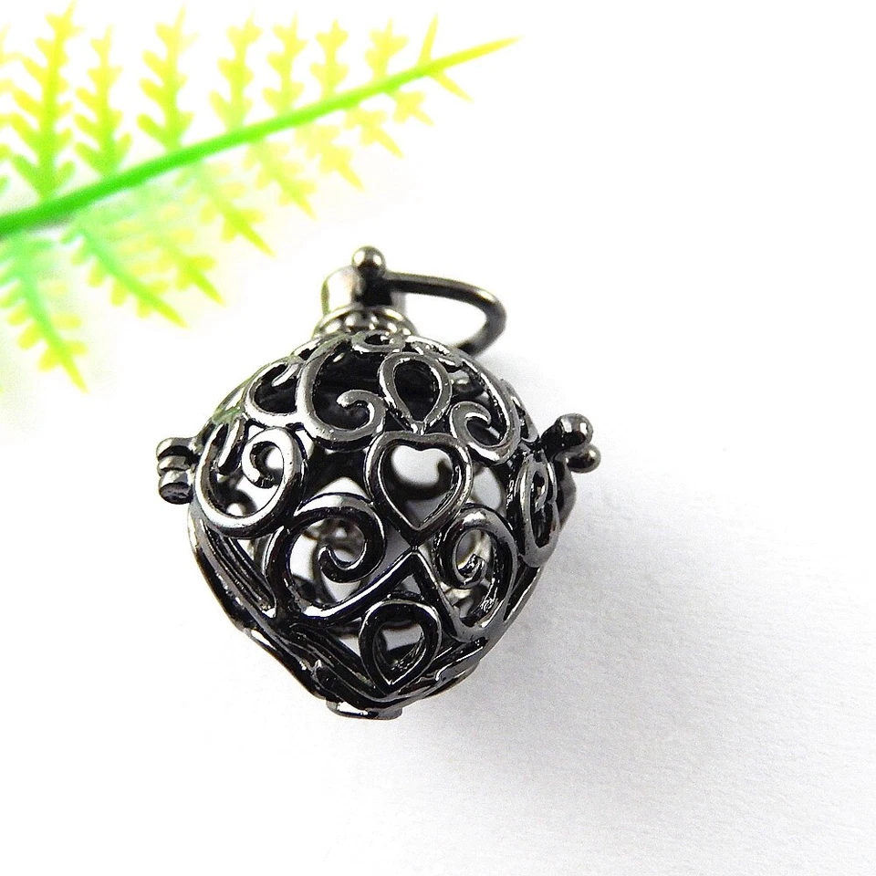 2 PIEZAS Medallón Colgante Corazón Floral Huecado Negro Bola Mexicana Dije Llamador Ángel Foto 1 de 4