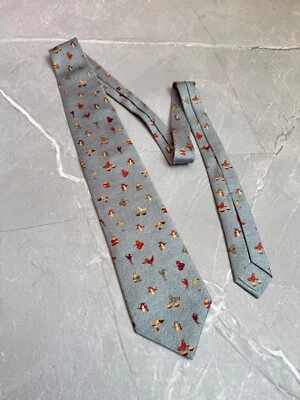 Corbata Bvlgari x Davide Pizzigoni 100 % seda estampado por todas partes personaje plateado azul Foto 1 de 4