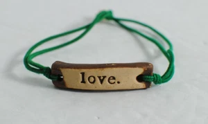 Mud Love Signed Loved Charm Bracelet Green Stretch Adjustable Valentine 5 in - Picture 1 of 6