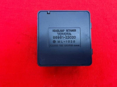 1985-88 Toyota Cressida Headlamp Retainer 85961-22020*Working Pull - Image 1 of 2