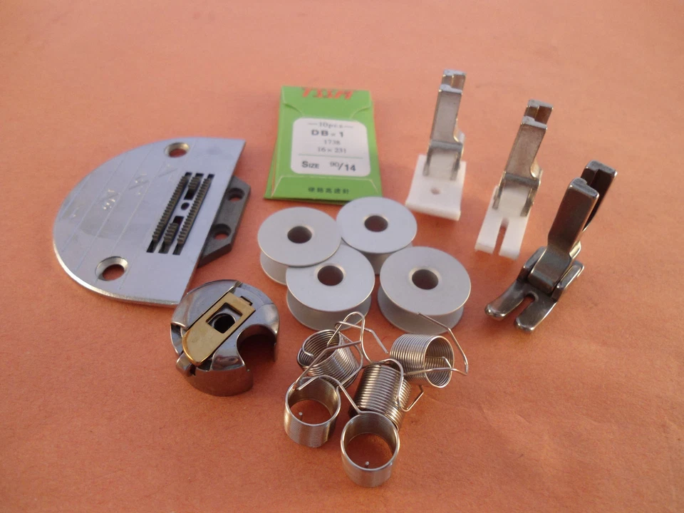 ПИТАТЕЛЬ ИГОЛЬЧАТОЙ ПЛАСТИНЫ JUKI DDL-5550,8700,8300,555, ФУТЛЯР ДЛЯ КАТУШКИ, ПРИЖИМНАЯ НОЖКА/НОЖКИ  - Изображение 1 из 1