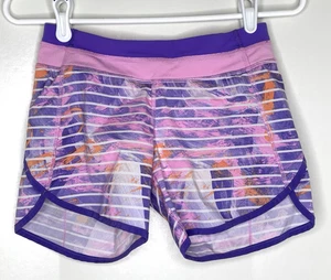 Ivivva by Lululemon Mädchen 12 sportliche Laufshorts pink lila Streifen Print - Bild 1 von 5