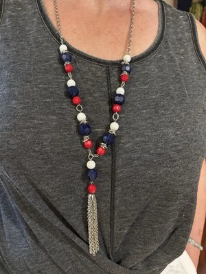 Blue, Black, Gold, Red, and White beaded necklace With Tassel - Image 1 of 4