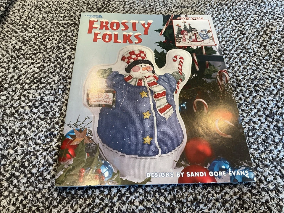 Leisure Arts FROSTY FOLKS Cross-Stitch Pattern Leaflet Book #3427 Sandi G. Evans - Image 1 of 3