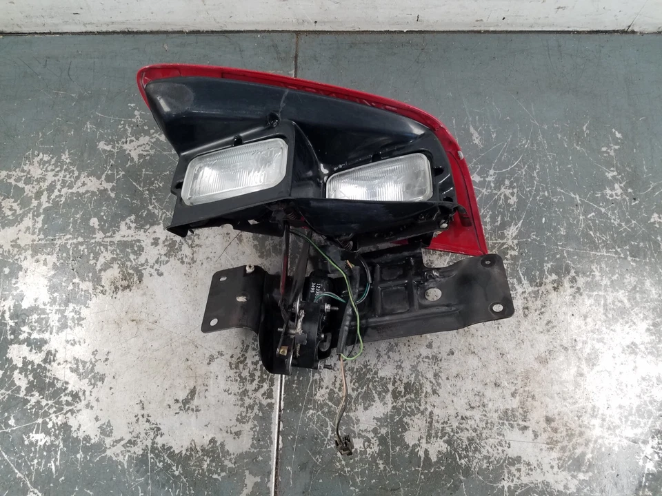 1998 庞蒂亚克 Trans Am 左球杆头灯 #2430 J5 — 第 1/4 张图片