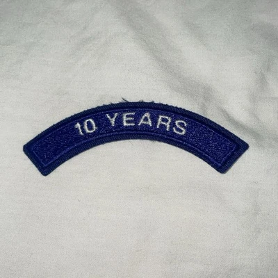 "10 YEARS" Blue & White Embroidered Rocker Tab Patch Service Award - Image 1 of 4