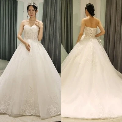 Шикарный трапециевидный свадебные платья без бретелек без спинки кружева аппликации свадебные платья - Изображение 1 из 4