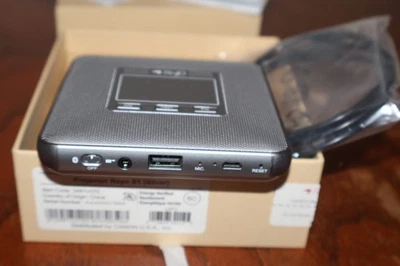 Proyector Canon Rayo S1 100 lúmenes WVGA DLP pico con Wi-Fi en funcionamiento Foto 1 de 4