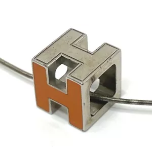 HERMES Accessories Cardue Ash H cube Necklace Metal Orange x Silver - Picture 1 of 9