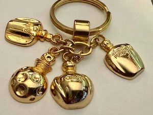 Raro Portachiavi Profumo Christian Dior Tono Oro Charm Borsa Accessorio Estate - Foto 1 di 5