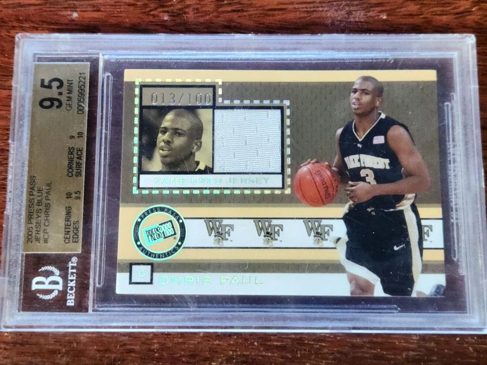 Tarjeta de novato Chris Paul 2005 Press Pass Jersey dorado #JC/CP 013/100 Beckett 9,5 Foto 1 de 2