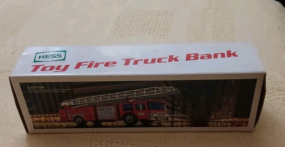 Banco de camiones de bomberos de juguete Hess 1986 rojo con escalera y luces y sonidos del motor NUEVO Foto 1 de 4