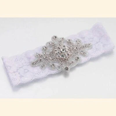 Liga nupcial blanca con joyas, cristales Foto 1 de 4