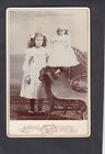 Cabinet Card w young girl posing with her large look-alike doll in IOWA c1890