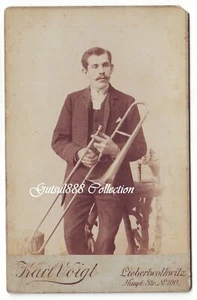Trombonist. Trumpet musician. Cabinet. 1880 - 00. - Picture 1 of 3
