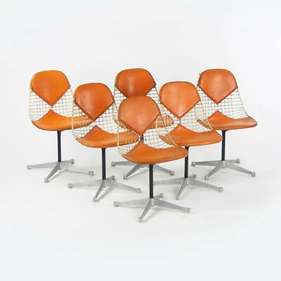 C. 1961 Set of 6 Herman Miller Eames Orange Bikini Pad Swivel PKC2 Dining Chairs - Image 1 of 4