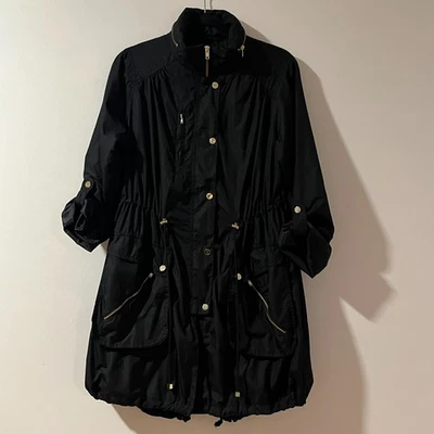 Chaqueta larga negra H&M Anorak talla S manga lengüeta enrollable capucha oculta cortavientos ligera Foto 1 de 4