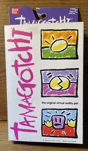 1996 Ban Dai Tamagotchi The Original Virtual Reality Pet Orange New in Box - Picture 1 of 5