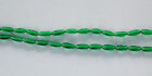 VINTAGE 12 GREEN GLASS OBLONG THIN RICE BEAD BEADS 10mm DEAD STOCK JAPAN