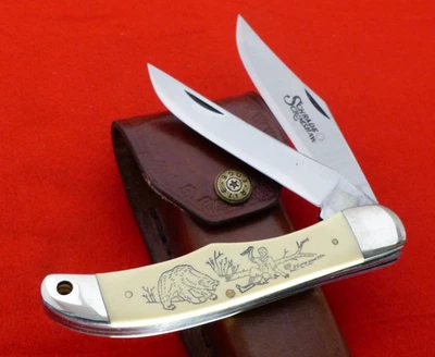 Schrade EE. UU. 5,25" Cerrado Oso Pardo Scrimshaw SC508 Cuchillo Cazador Plegable COMO NUEVO Foto 1 de 4