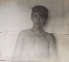 young athletic guy with a naked torso -  Int Vintage Photo