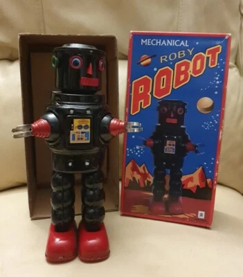 Retro mechanischer Robby Roboter Blechplatte HA HA Spielzeug mit Schlüssel - Bild 1 von 4