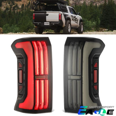 Par de luces traseras LED prismáticas alfa negras Fit 2024 Toyota Tacoma serie NOVA Foto 1 de 4