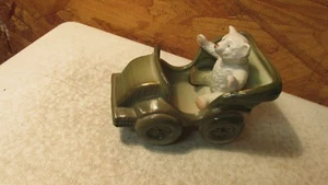 Antiguo carenado oso en automóvil - Imagen 1 de 2