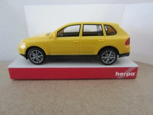 HERPA 023153 PORSCHE CAYENNE TURBO YELLOW - model is PLASTIC - HO or 1:87 scale - Picture 1 of 1