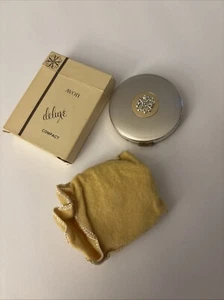Polvo facial Avon vintage años 50 color plata compacto sin usar - Imagen 1 de 5