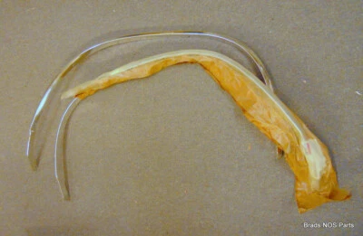 NOS Mopar 1985-1987 Relaint Aries 1986-1988 Dodge 600 K  FRT WHEEL OPENING MLDGS - Image 1 of 4