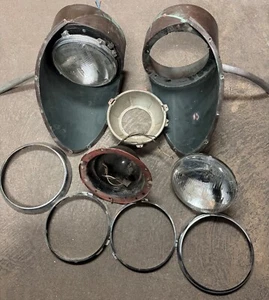 Jaguar XKE Late Series 1.5 - 2 OEM Headlight Buckets/Bulbs/Rings/Outer Finisher - Picture 1 of 11