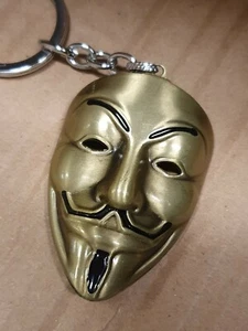 V for Vendetta Dystopian Guy Falkes Máscara de Bronce Llavero Vendedor Reino Unido P&P Gratis - Imagen 1 de 8