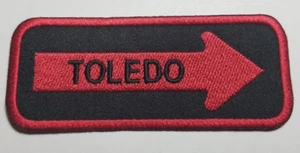TOLEDO Oneway Arrow Embroidered Patch Iron on aprox 1.25x4" - Picture 1 of 2