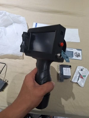 Impresora de inyección de tinta portátil Phezer P15 para cualquier superficie fecha código QR código de barras logotipo Foto 1 de 4