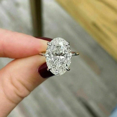 Anillo solitario de boda de oro blanco de 14 K de corte ovalado de 5 quilates VVS1 creado en laboratorio FN Foto 1 de 4