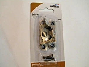 Stanley National Hardware N148-809 V600 Crescent Rigid Sash Lock, Antique Brass - Picture 1 of 2