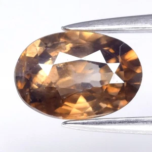💎 1.11ct 7x4.8mm Oval Natural Champagne Zircon - Unheated, Tanzania Gemstone - Picture 1 of 4