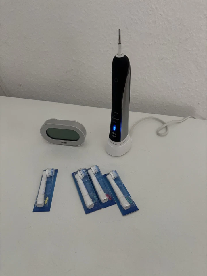 OralB Elektrische Zahnbürste mit Ladestation Smartguide und 4 Ersatzzahnbürsten - Bild 1 von 4