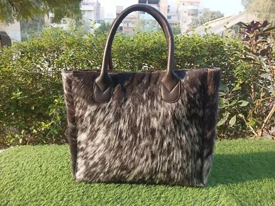 Bolso de mano para mujer de cuero genuino con estampado de animales de vaca Foto 1 de 3