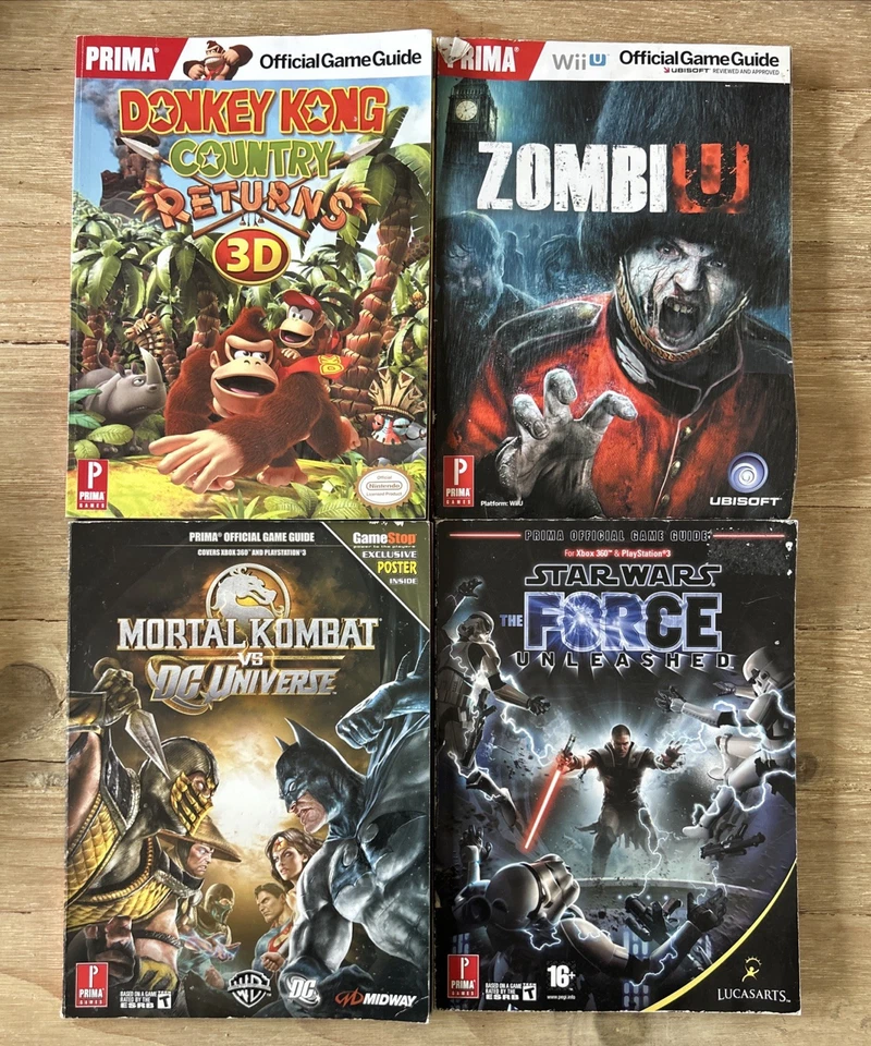 4 Strategy Guides Nintendo Xbox360 PS3 Wii Donkey Mortal Kombat Zombi Star Wars - Image 1 of 1