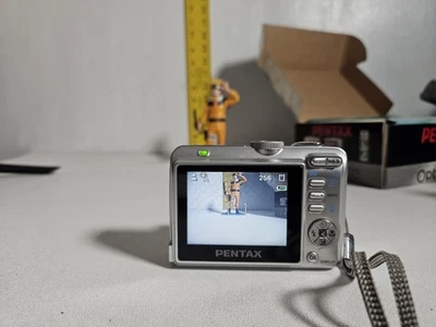 Pentax Optio E10 6MP Digital Camera with 3X Optical Zoom USB Cable, AV Cable - Image 1 of 4