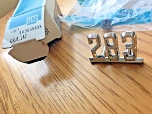 NOS GM 283 emblem GR.8.147 1#3865833 - Bild 1 von 2