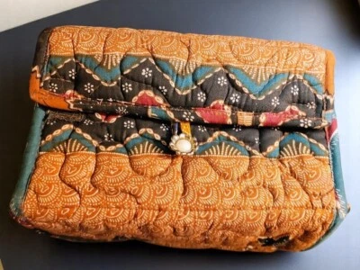 Organizador de maquillaje enrollable material colorido y acolchado Foto 1 de 4