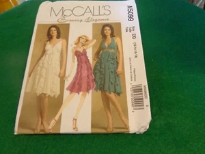 MCCALLS SCHNITTMUSTER ABEND ELEGANZ GR. 12-18 5099 - Bild 1 von 1