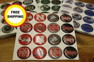 NEBRASKA CORNHUSKERS 16-PIECE SET 1" ROUND STICKERS WITH CLEAR DOME COVER - Image 1 of 4