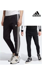 Adidas Adicolor Classics SST Trainingshose schwarz (IL2488) -l Large - Bild 1 von 4