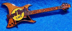 GUITARRA ARIA FRONTAL HRC MELBOURNE AUSTRALIA GOLD EYEBALL 1999 Hard Rock Café PIN - Imagen 1 de 1